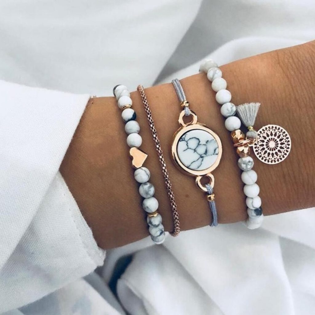 Bracelet créatif géométrique à franges creuses en pierre de pin quatre pièces
